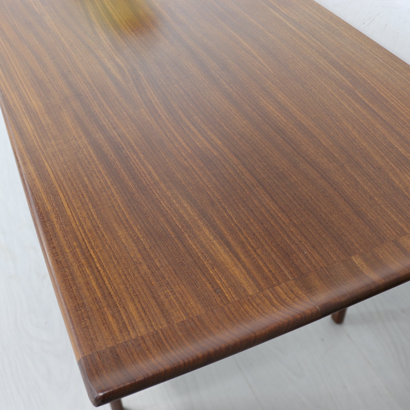 A. Younger Long Solid Afromosia Floating Top Coffee Table - teakyfinders